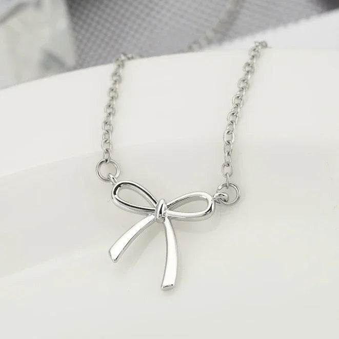 Gold bow necklace for women