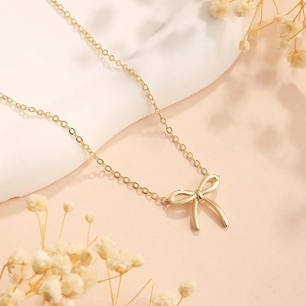 Gold bow necklace for women