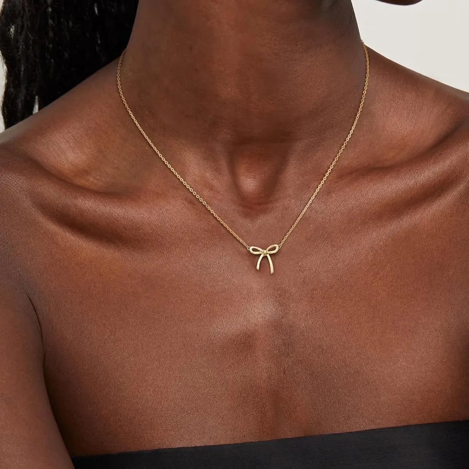 Gold bow necklace for women